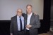 Dr. Nagib Callaos, General Chair, giving Prof. Detlev Doherr an award "In Appreciation for Delivering a Great Workshop and Plenary Keynote Address."
